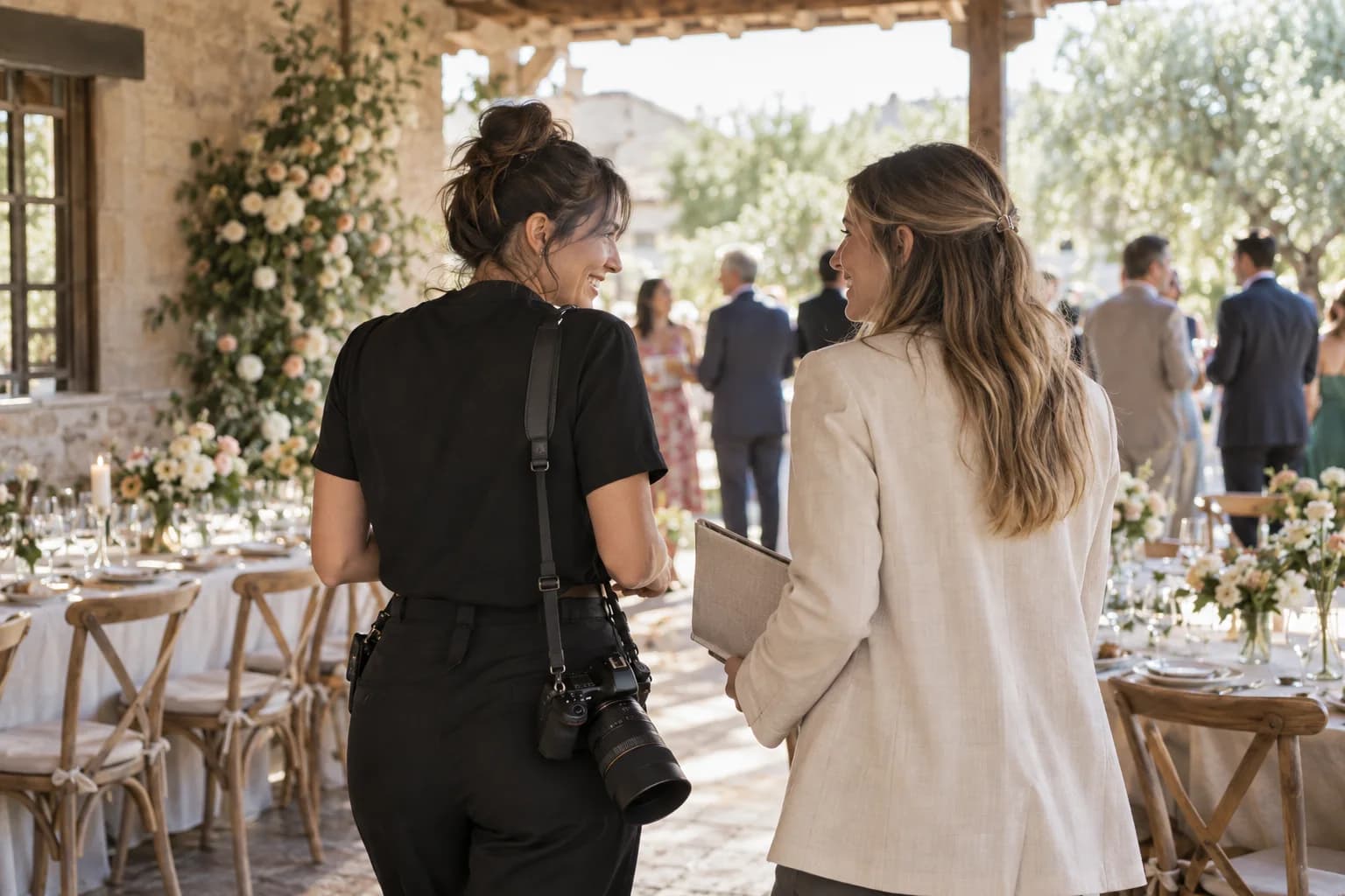 Event professionals sharing a relaxed moment while preparing a celebration